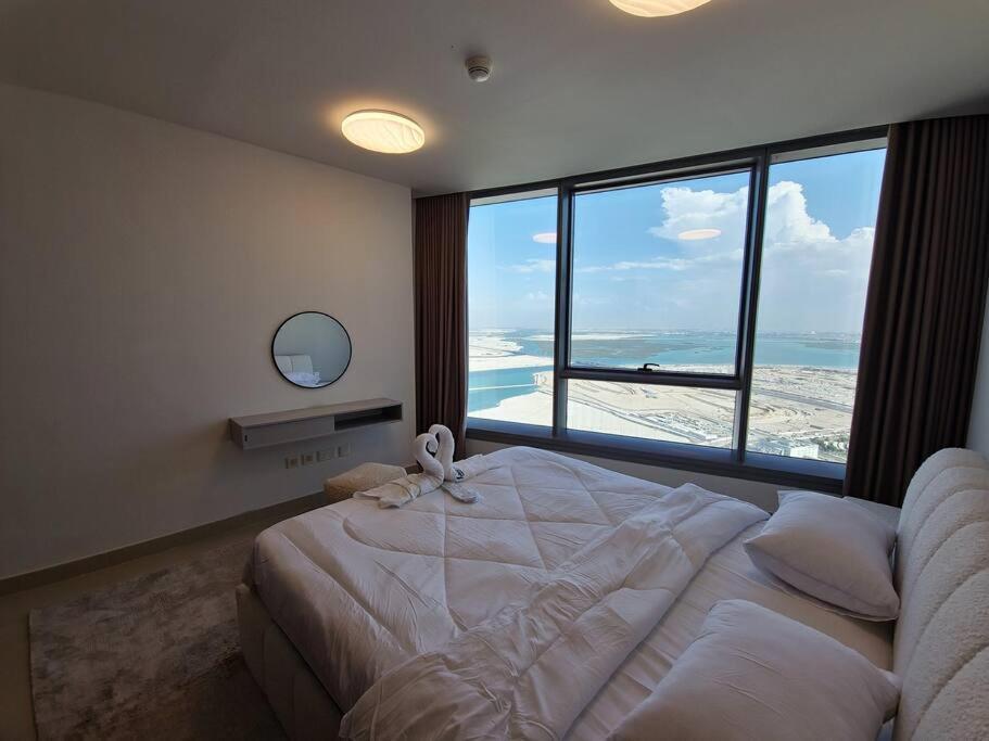 Harf5110-luxury 1br W Pool & Gym Абу-Дабі