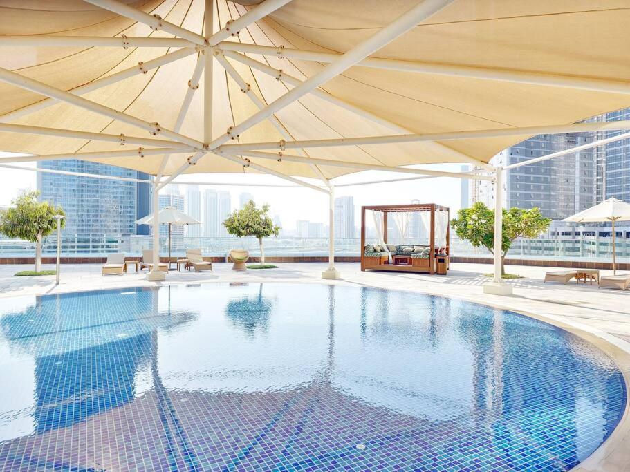 Harf5110-luxury 1br W Pool & Gym Апартаменти